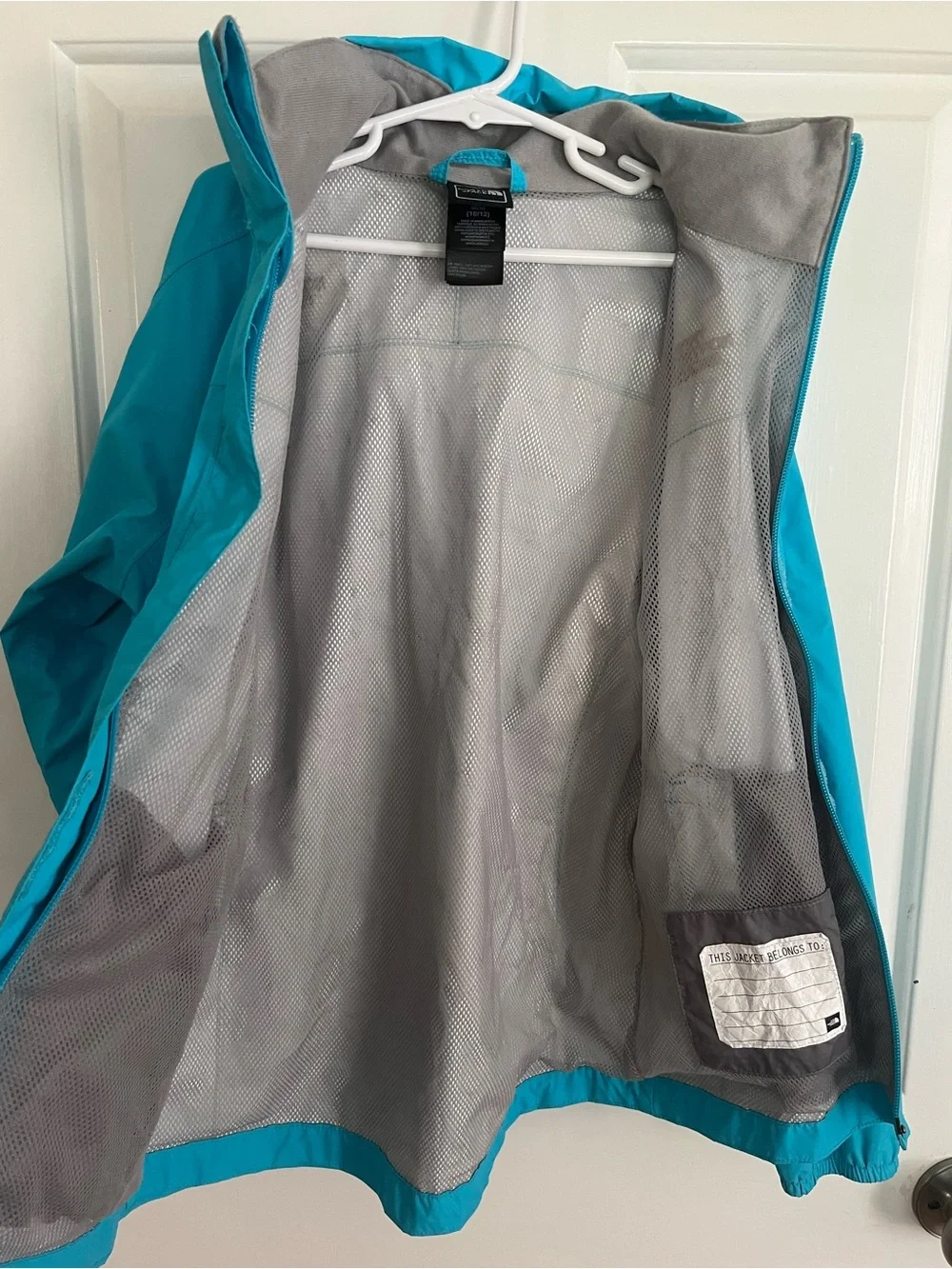 The North Face Resolve Blue Hooded Kids Rain Jacket